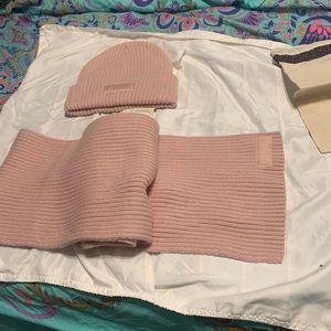 Victoria’s Secret pink scarf and knit beanie